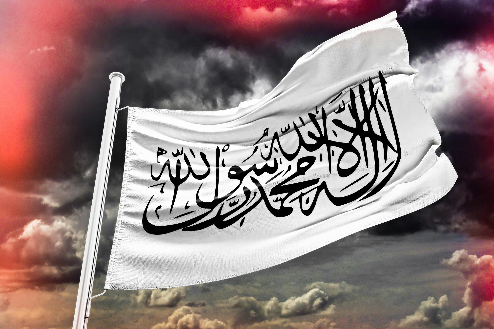 پرچم طالبان با زمینه سفید و متن مشکی لا اله الا الله محمد رسول الله