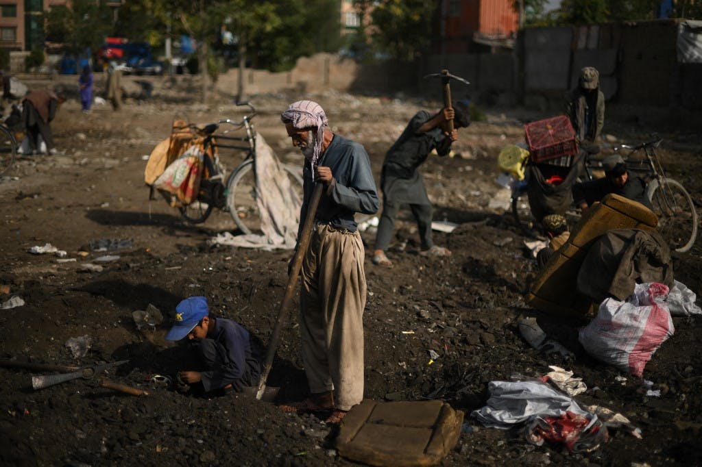 از دوره سلطه طالبان فقر و ناامیدی در افغانستان گسترده‌تر شده است. Daniel LEAL / AFP