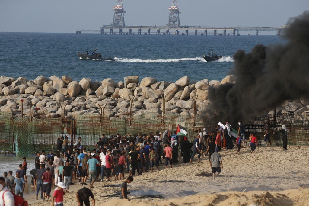 اعتراضات ساکنان نوار غزه در ساحل غزه برای بازگشت فلسطینیان آواره، عکس: خبرگزاری فرانسه