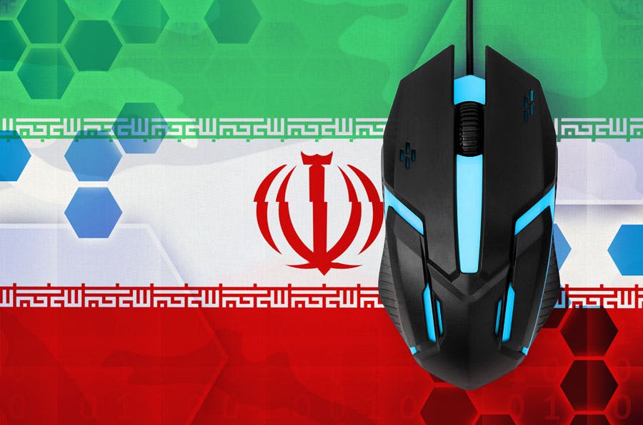 در تصویر یک ماوس کامپیوتر روی پرچم جمهوری اسلامی ایران و نماهایی از یک سلول در پس‌زمینه دیده می‌شود.