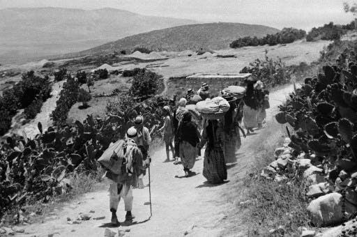 تصویر تاریخی خبرگزاری فرانسه در ۱۵ سپتامبر ۱۹۴۸ میلادی، آوارگان فلسطینی را نشان می‌دهد که از دهکده‌شان رانده شدند.